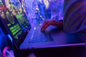 Business owner reviewing an IT invoice covering antivirus vs firewall vs monitoring